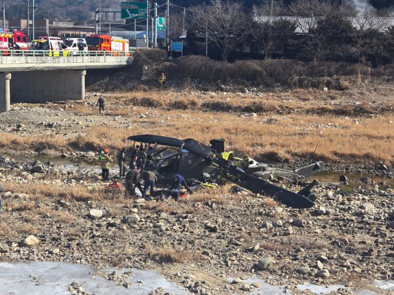 Army and fire authorities secure the site after an AH-1S Cobra helicopter belonging to an Army aviation unit crashes in Hyeon-ri, Jojong-myeon, Gapyeong County, Gyeonggi, on Feb. 9. [YONHAP]