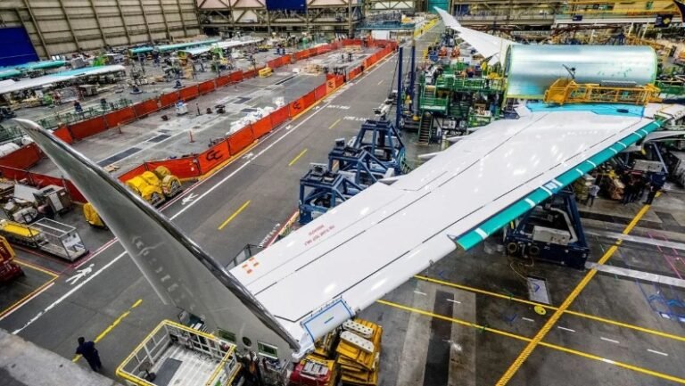 The 777-8 freighter wings and mid-fuselage section come together