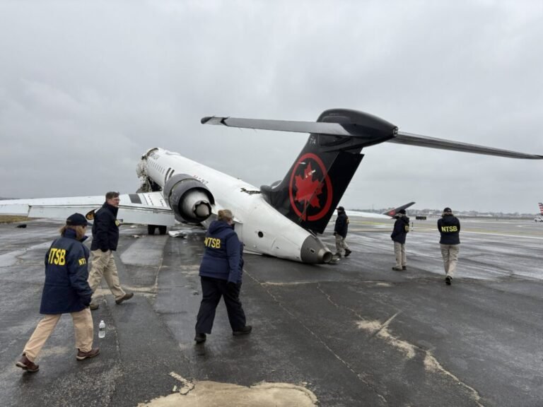 NTSB investigators LaGuardia Airport CRJ 900 fire truck collision
