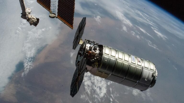 NASA Invites Media to Northrop Grumman CRS-24 Station Resupply Launch Northrop Grumman's Cygnus XL cargo craft, carrying over 11,000 pounds of new science and supplies for the Expedition 73 crew, is pictiured moments before its capture with the International Space Station's Canadarm2 robotic arm. Both spacecraft were orbiting 257 miles above Namibia. Cygnus XL is Northrop Grumman's expanded version of its previous Cygnus cargo craft increasing its payload capacity and pressurized cargo volume.