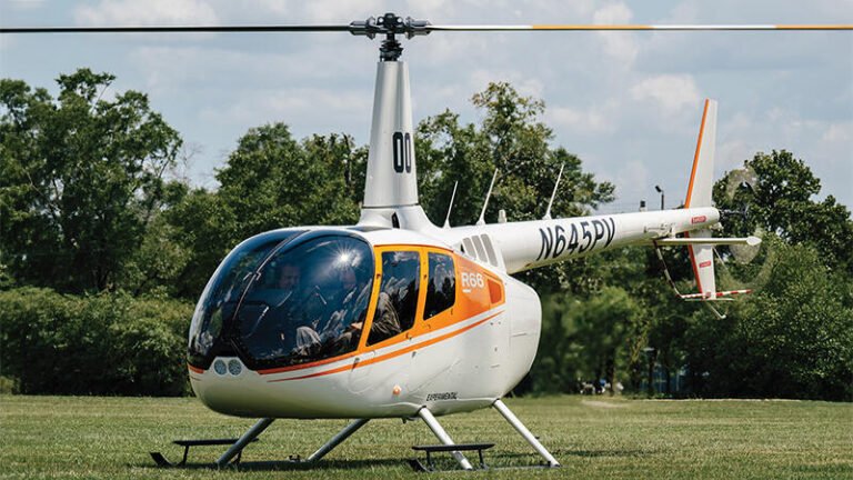 Robinson R66 on grass