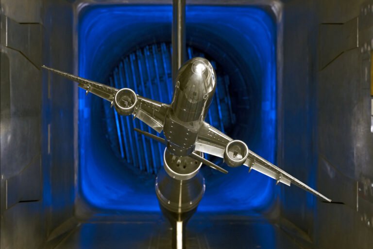 Transformational Tools and Technologies Resources A scale model of a silver jet airliner with two engines is tested in a wind tunnel, part of the TTT available resources.