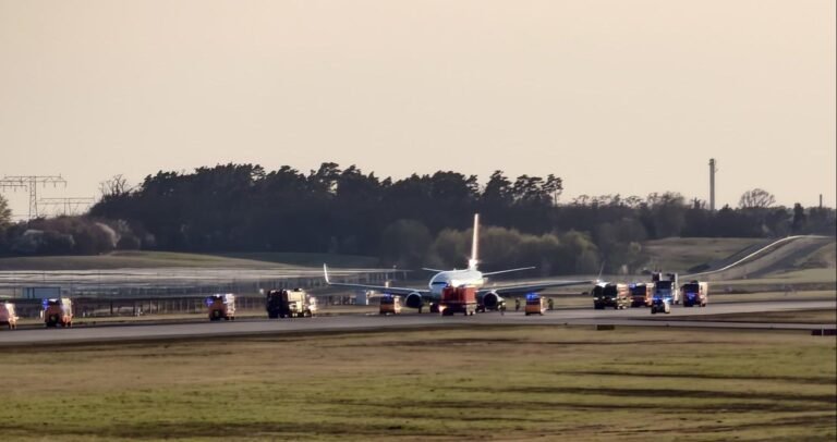 BREAKING Ryanair flight FR315 surrounded by firetrucks after emergency landing at Berlin Brandenburg Airport