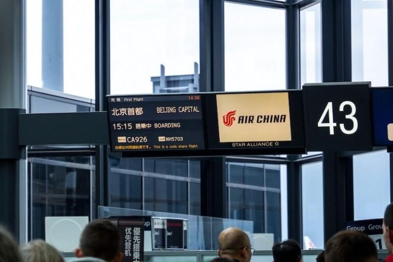 Chinese Cross-Border Travel Surge Driven By Visa-Free Policies Air china flight info at airport gate