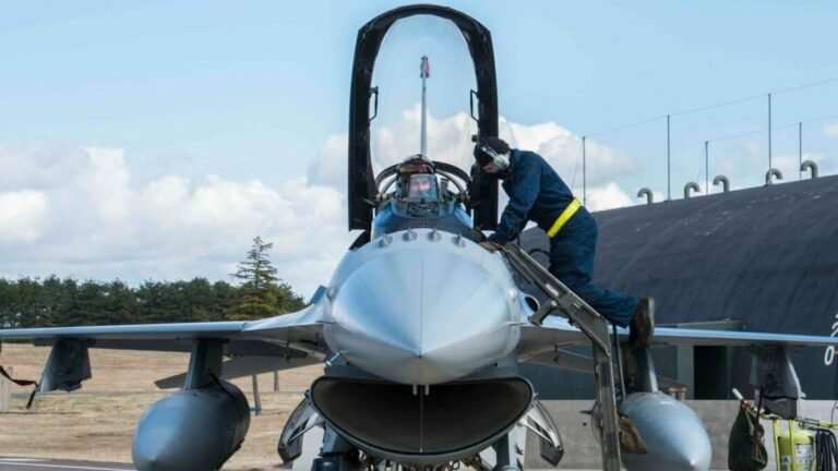 Military pilot in cockpit photo