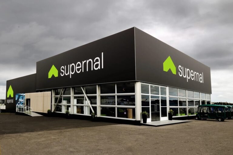 Hyundai Air Taxi Arm Supernal Reemerges With Plans for New Design Supernal electric air taxi booth at Farnborough 2024