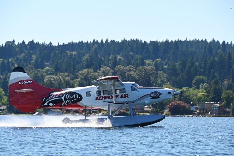 One of Kenmore Air’s seaplanes is wrapped in the Puyallup Tribe’s and Emerald Queen Casino’s colors and salmon. [Courtesy: Kenmore Air]