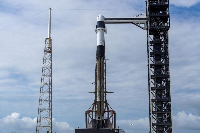 A SpaceX Falcon 9 rocket, with the company’s Dragon spacecraft atop, stands at Space Launch Complex 40 at Cape Canaveral Space Force Station in Florida on Wednesday, May 13, 2026, i