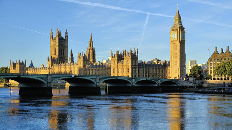 Houses of Parliament and Westminster Bridge with reflections in the Thames