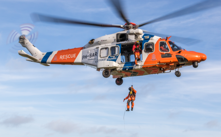 Bristow to Acquire Berry Aviation in $105M Transaction Bristow Group helicopter conducting coast guard search and rescue operations