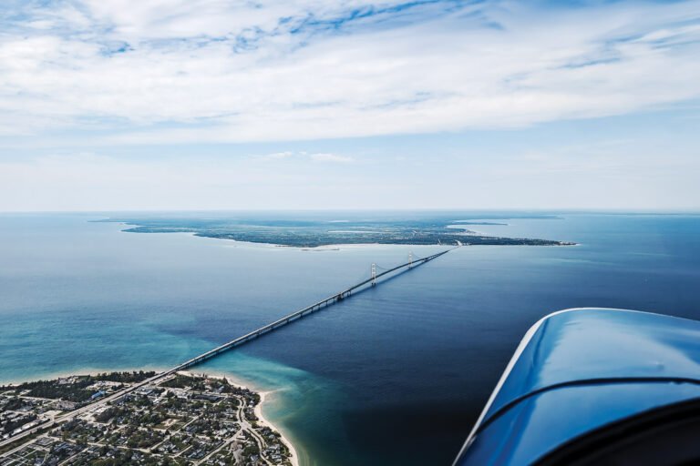 The Mackinac Bridge, which spans just under 5 miles, opened in 1957, connects the upper and lower peninsulas of Michigan. [Credit: Neil Harris]