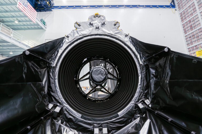 NASA’s Roman Space Telescope Primary Mirror Gets Last Look Wide shot, close-up view of Roman's primary mirror