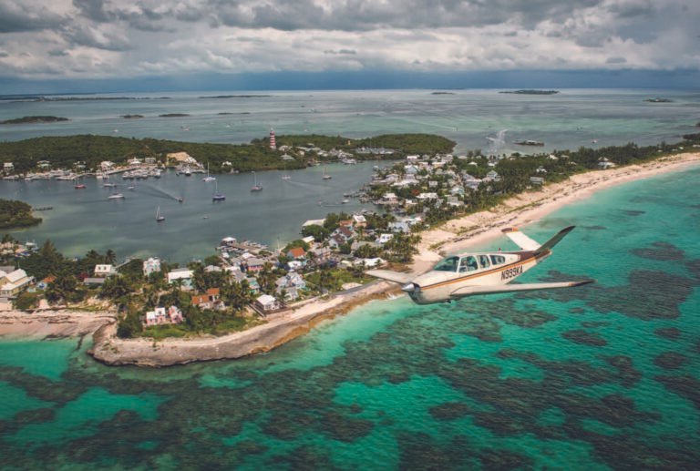 One of the most recognizable sights in the Abacos Islands in the northern Bahamas is the red-and-white-striped Elbow Reef Lighthouse. [Credit: Glenn Watson]
