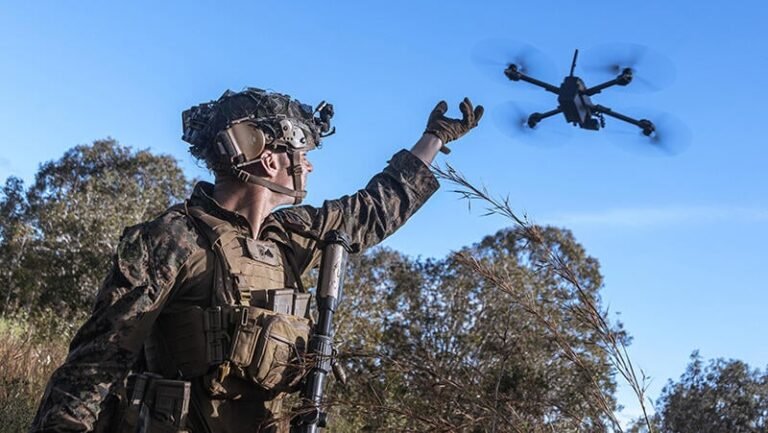 U.S. Drone Demand Moves Acquisition To The Field soldier launching a drone
