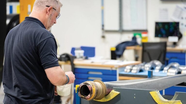 GE Outlines Dowty Blade Technology Study For CFM Open Fan person working on fan blade