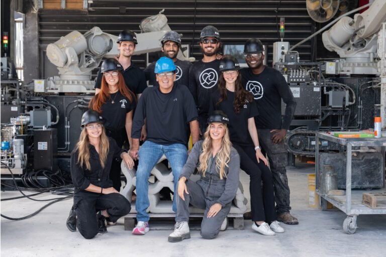 Kind Designs Founder & CEO Anya Freeman with team members and investor Mark Cuban. Photo via Kind Designs.