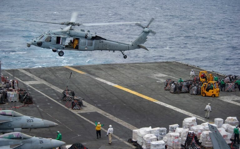 U.S. Navy Sikorsky MH-60S Seahawk helicopter landing on aircraft carrier