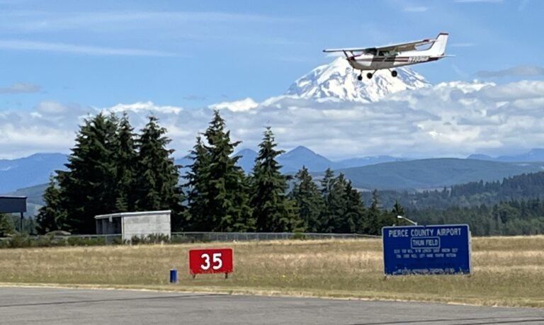 Airplane on approach at Pierce County Airport-Thun Field in South Hill, Washington. [Credit: Meg Godlewski]