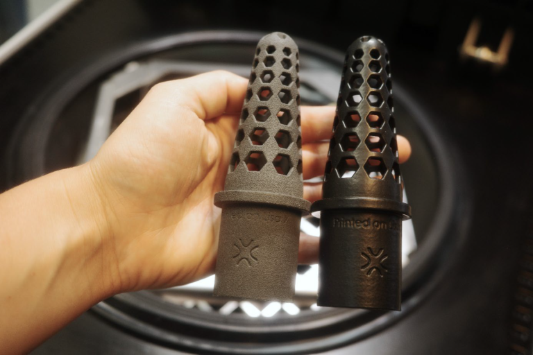 Grey Sinterit parts printed on Lisa X & finished with the DyeMansion VX1. Photo via DyeMansion.