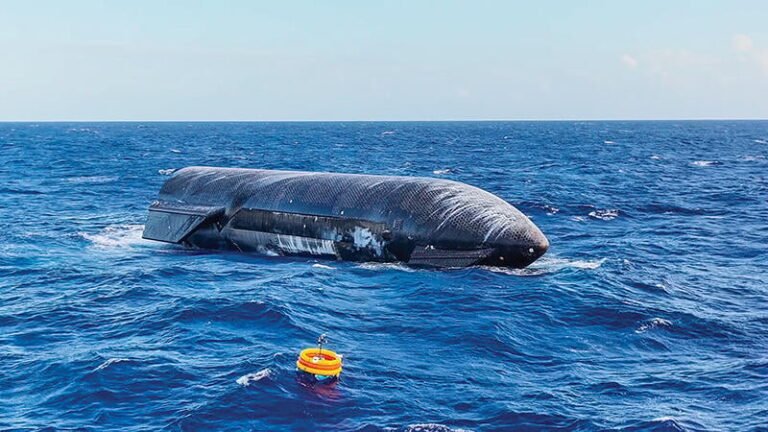 Starship-Super Heavy Test Program Achieves Milestones With Flight 13 starship floating in the sea