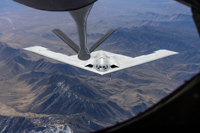 U.S. Air Force To Keep Two Pilots For B-21s B-21 refueling in flight