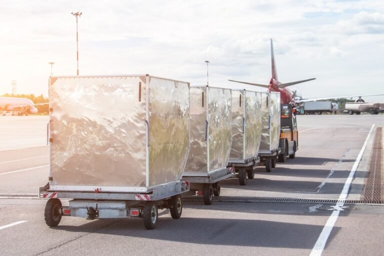 ULDs being transported on airport runway