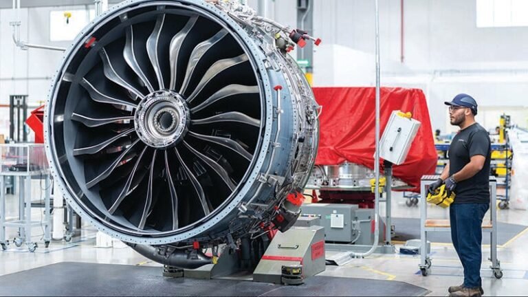 CFM Leap MRO Network Growth Surges To Keep Up With Fleet CFM International Leap engine with person standing next to it