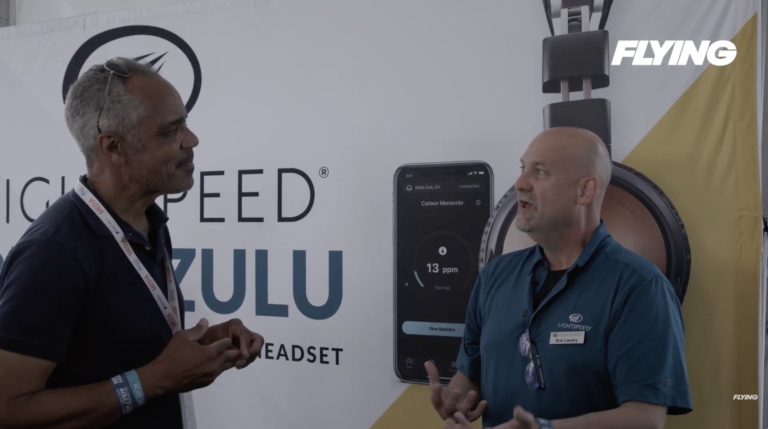 The Aviation Consumer’s Jonathan Welsh (left) talks with Eric Landy, head of marketing for Lightspeed Aviation, at EA AirVenture in July. [Credit: FLYING]