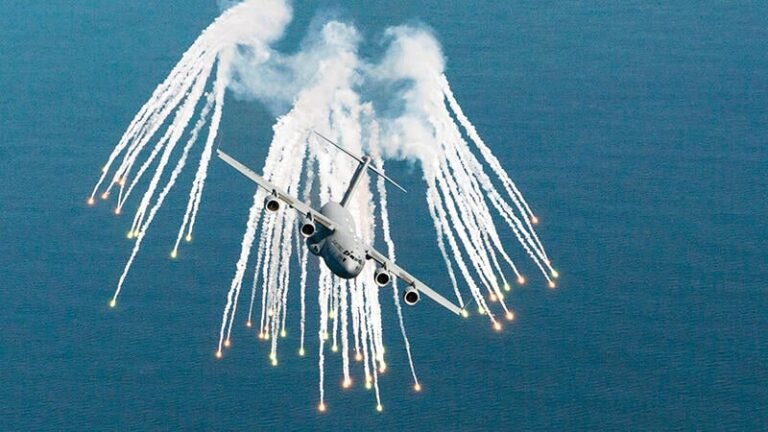 Kinetic Self-Defense Is Coming To The U.S. Air Mobility Fleet Boeing C-17 deploying flares over water