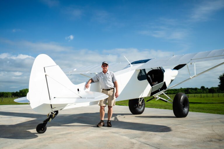 Florida native Chuck Kinberger poses with his CubCrafters FX-3 Carbon Cub on 35-inch Alaskan Bushwheel tires. [Credit: Jon Whittle]