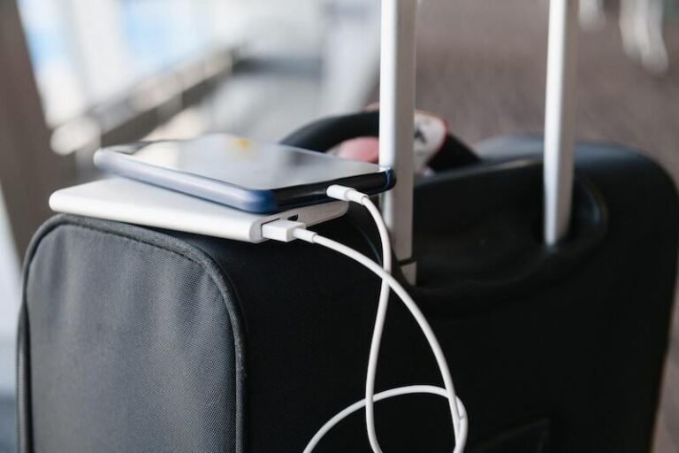 Portable Chargers Become Lead Cause Of Thermal Runaway Incidents portable charger on suitcase