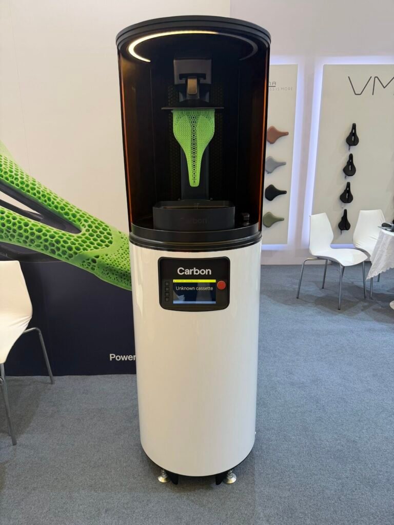Carbon DLS system printing lattice saddle. Photo via Carbon.