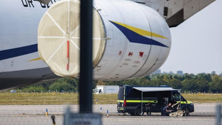 Commentary: Aviation Security Needs To Be Revisited police with explosive disposal robot next to Ukrainian cargo plane