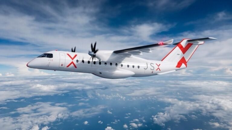 Heart Aerospace unveils larger ES-36 to replace ES-30 Rendering of a white twin-turboprop regional aircraft in JSX livery flying above clouds