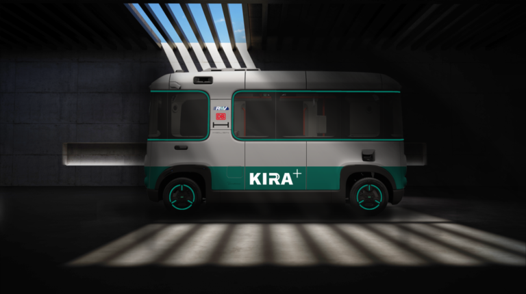 Holon joins project to help with AV operating area approval bottlenecks A green and white KIRA+ project autonomous vehicle in a parking lot.