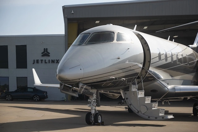 Is Private Jet Ownership Right for You? Private jet preparing for departure at a private terminal