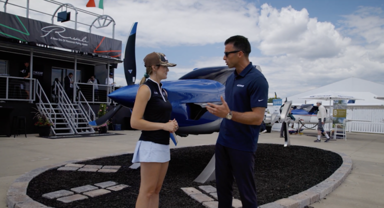 Plane + Pilot magazine’s Cayla McLeod (left) talks with Tecnam’s managing director, Giovanni Pascale in July. [Credit: FLYING]