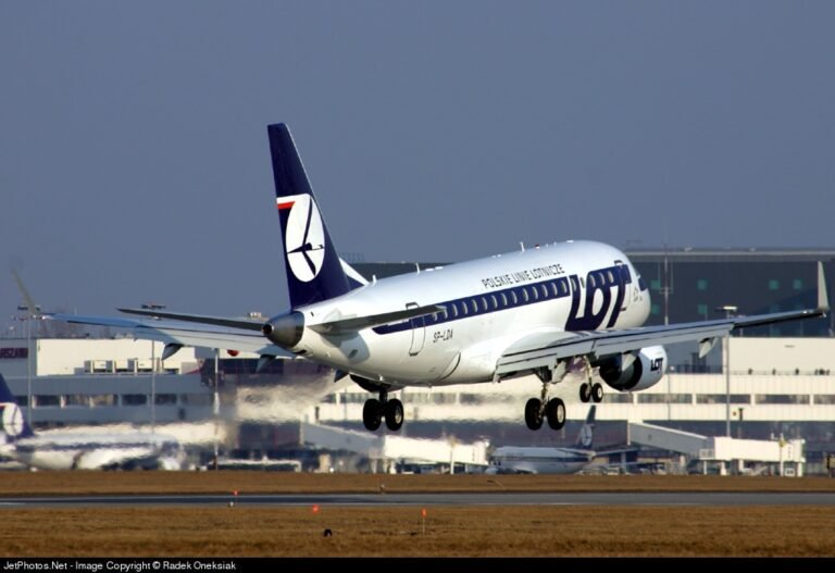 Launch customer LOT operates final Embraer E170 flight LOT SP-LDA E170 landing Warsaw after a test flight in 2004.