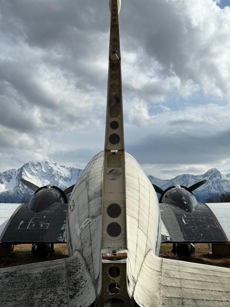 An abandoned Douglas DC-3 overlooks the mountains at Palmer Municipal Airport (PAAQ). [Credit: Cayla McLeod]