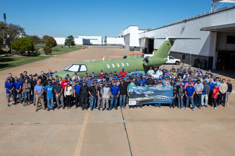 Textron Aviation employees celebrate the first Cessna Citation CJ4 Gen3 production unit rolling out of its facilities in Wichita, Kansas